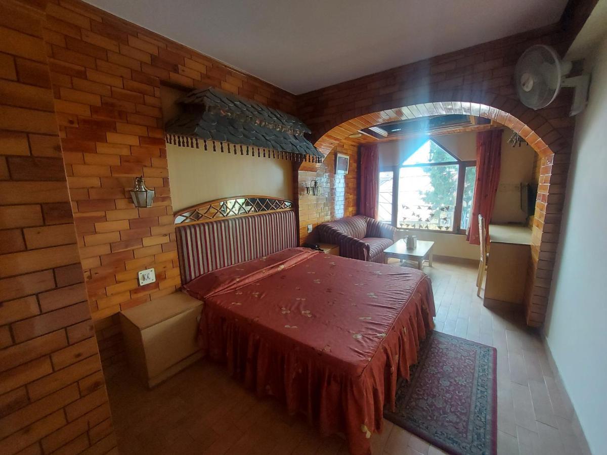 Brightland Hotel Shimla Bagian luar foto