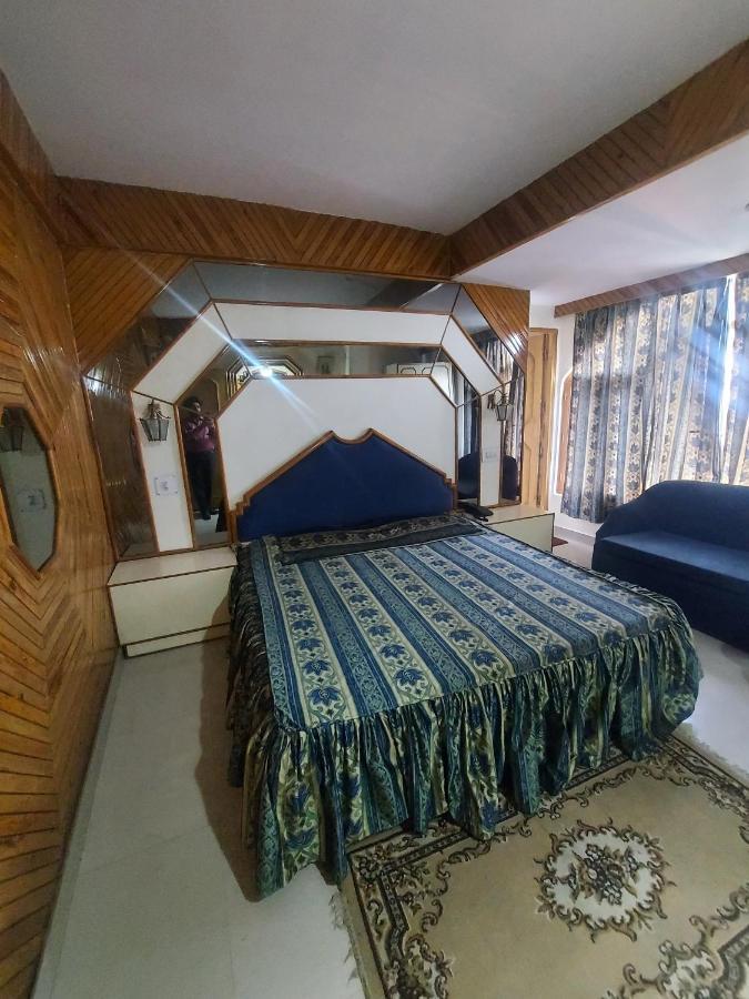 Brightland Hotel Shimla Bagian luar foto
