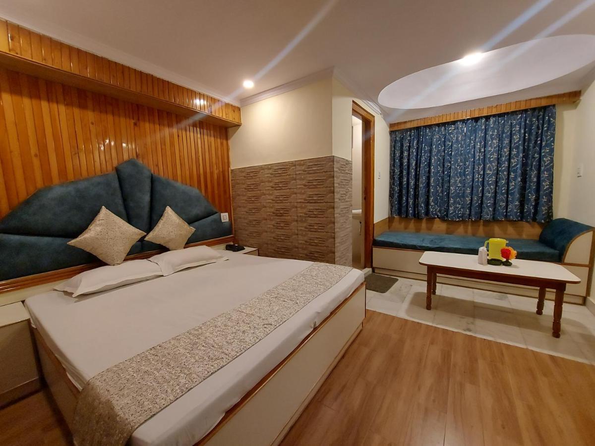 Brightland Hotel Shimla Bagian luar foto