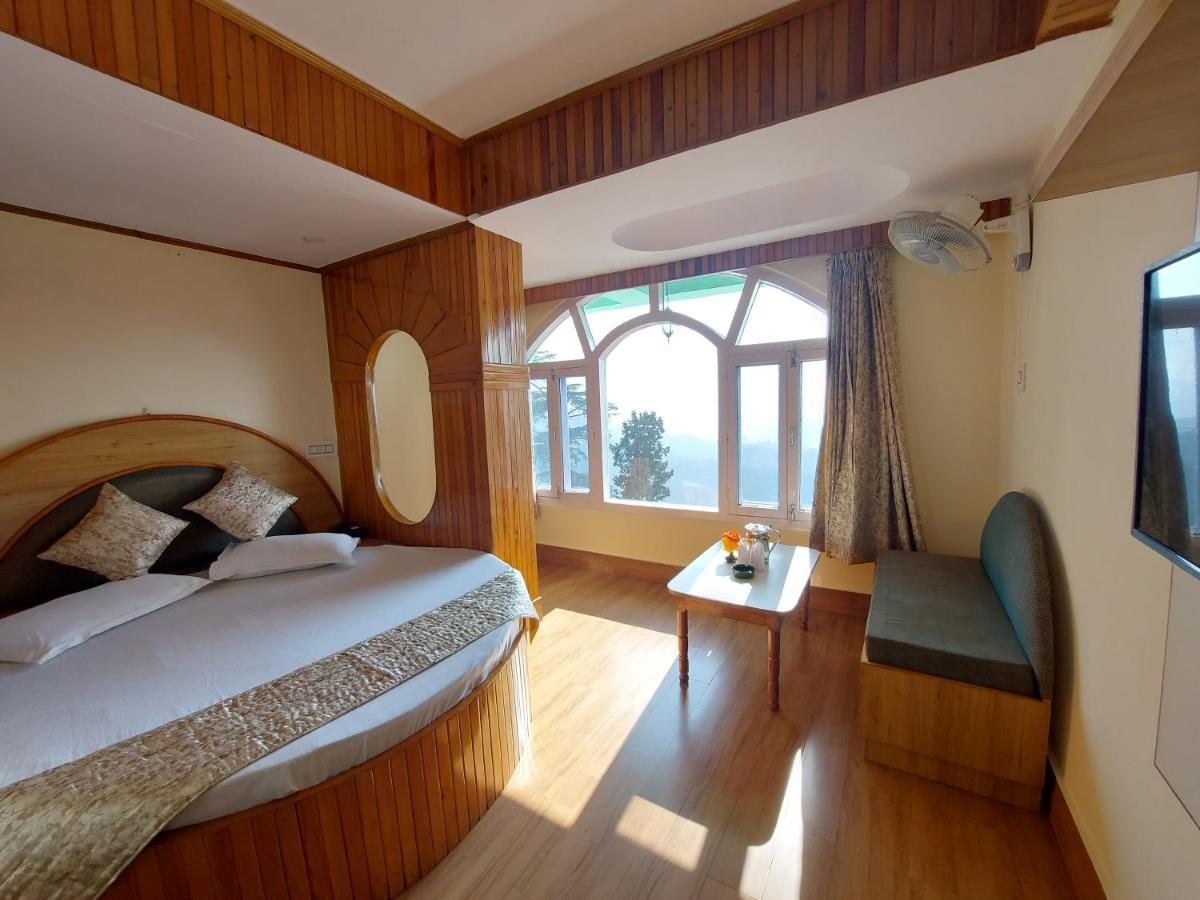 Brightland Hotel Shimla Bagian luar foto