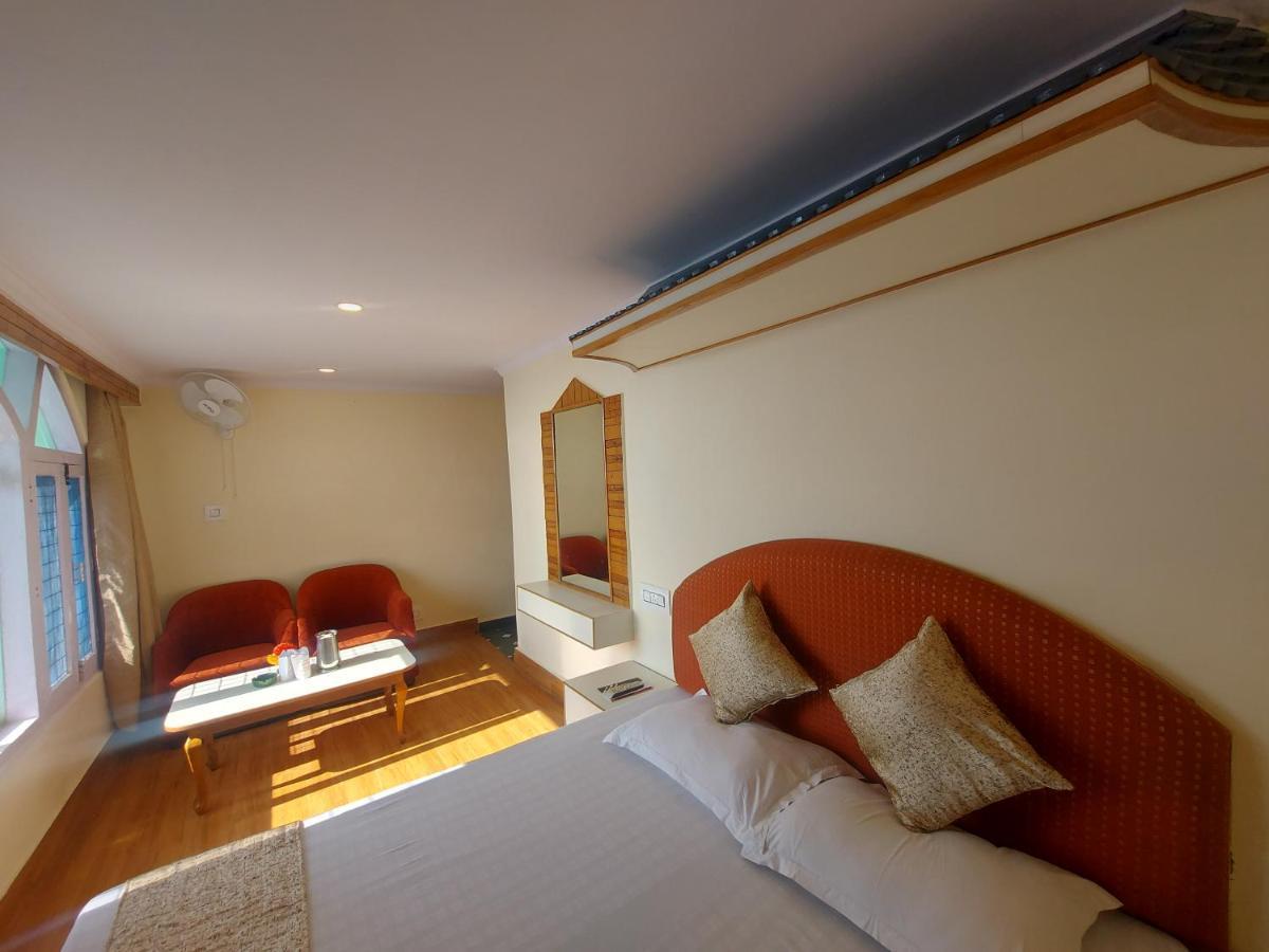 Brightland Hotel Shimla Bagian luar foto