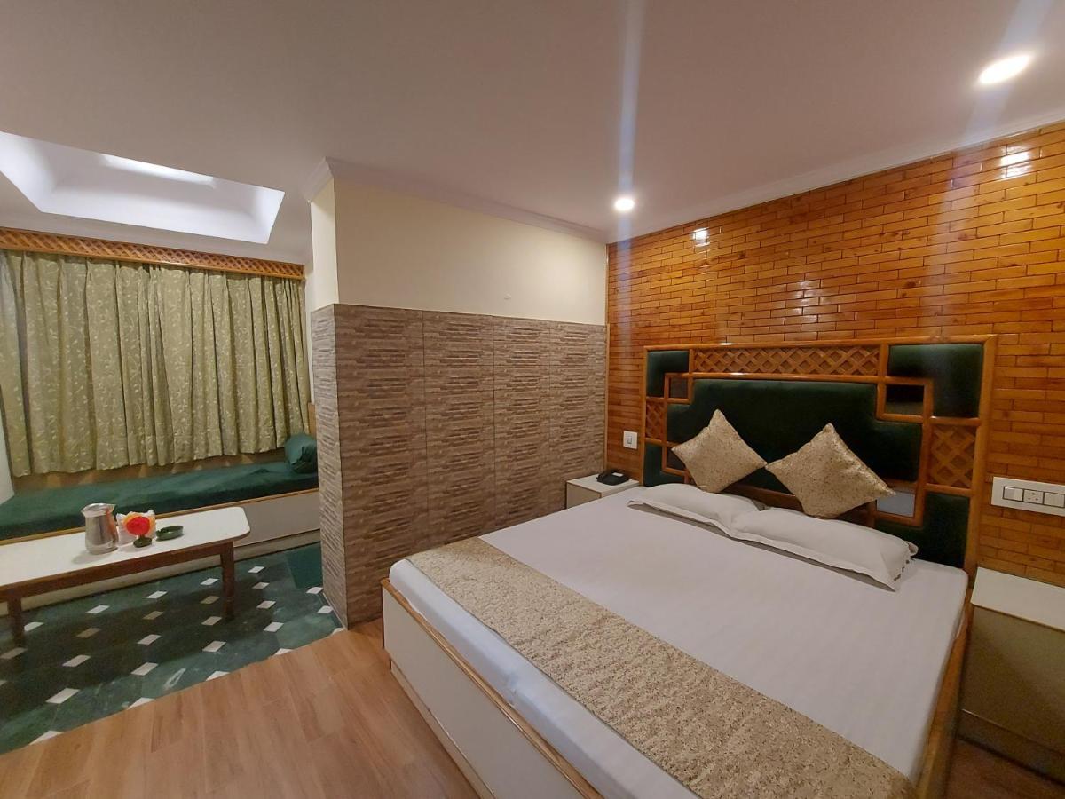 Brightland Hotel Shimla Bagian luar foto